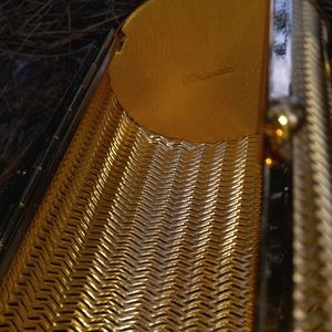 Majestic metal purse with lucite handle